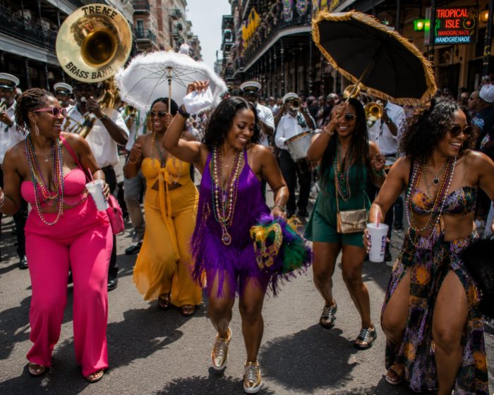 Dancing behind a brass band in a second line